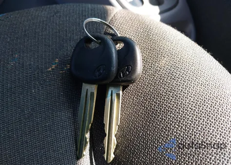 2004 Hyundai Accent Gl/Gt из США, поврежденный, VIN KMHCG35C94U279813